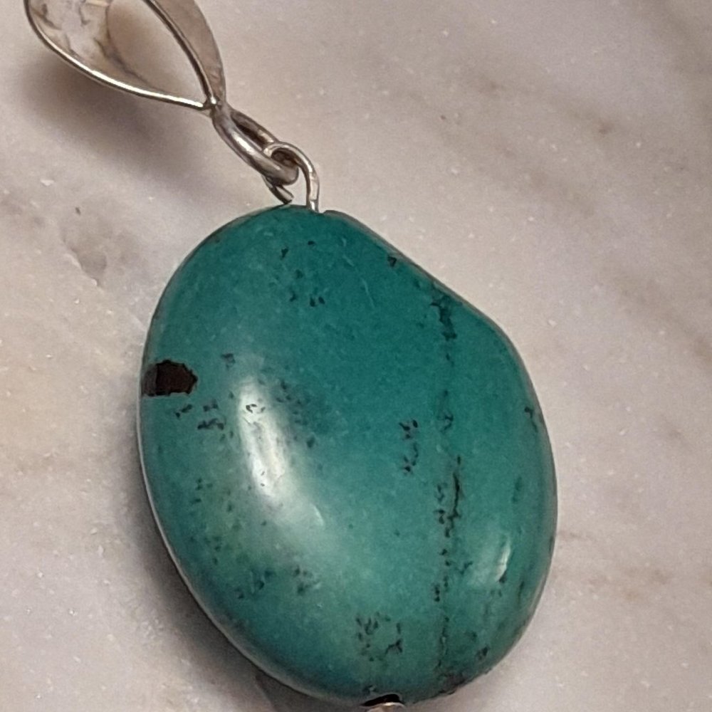 Turquoise Natural Shaped Pendant with Silver Tone Bail